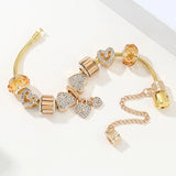 Golden Embrace: The Vintage Heart Charm Bracelet