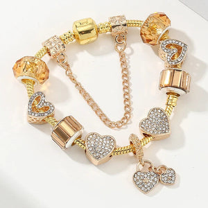 Golden Embrace: The Vintage Heart Charm Bracelet