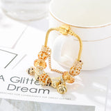 Queen’s Garden: The Golden Honeybee Charm Bracelet