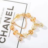 Queen’s Garden: The Golden Honeybee Charm Bracelet