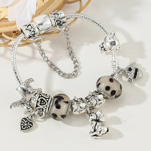 Whimsical Safari: The Silver Animal Charm Bracelet
