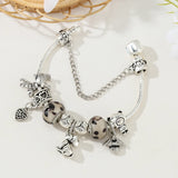 Whimsical Safari: The Silver Animal Charm Bracelet