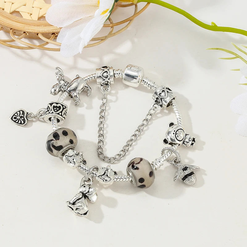 Whimsical Safari: The Silver Animal Charm Bracelet