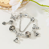 Whimsical Safari: The Silver Animal Charm Bracelet