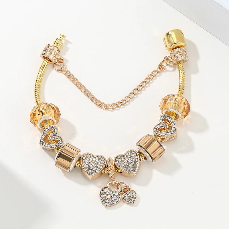 Golden Embrace: The Vintage Heart Charm Bracelet