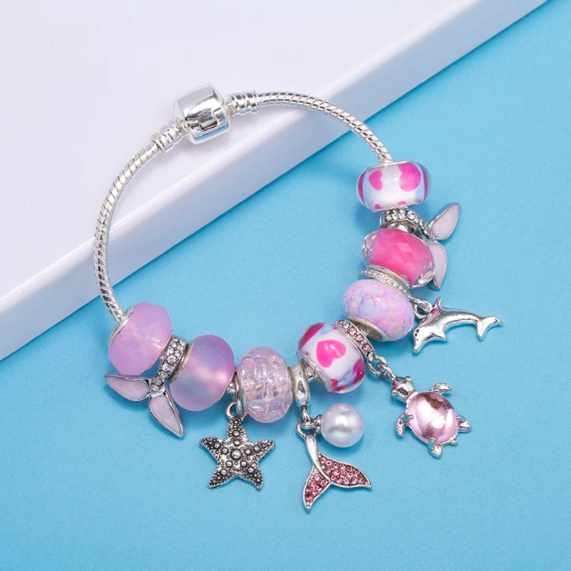 Lunar Petals: The Pink Butterfly Charm Bracelet