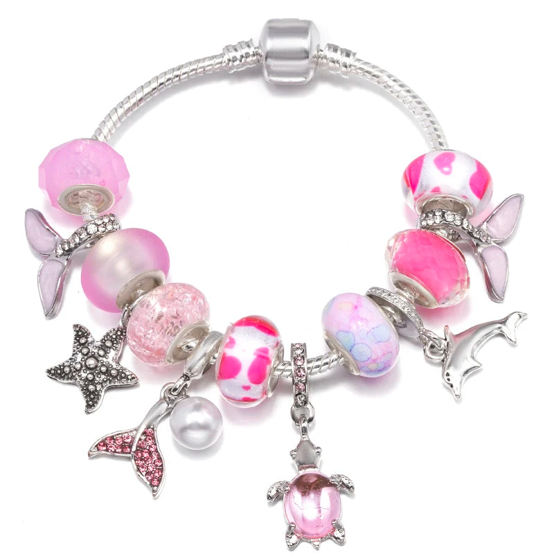 Lunar Petals: The Pink Butterfly Charm Bracelet