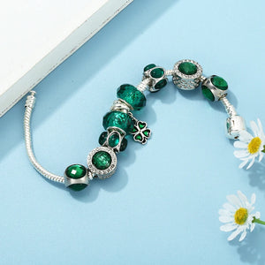 Emerald Whisper: The Murano Charm Bracelet