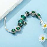 Emerald Whisper: The Murano Charm Bracelet