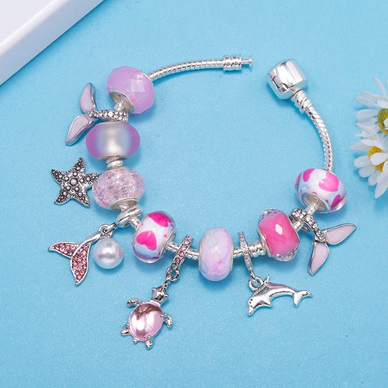 Lunar Petals: The Pink Butterfly Charm Bracelet