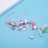 Lunar Petals: The Pink Butterfly Charm Bracelet