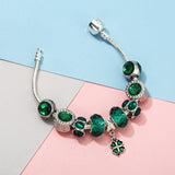 Emerald Whisper: The Murano Charm Bracelet