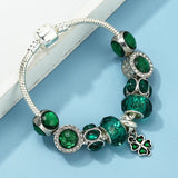 Emerald Whisper: The Murano Charm Bracelet
